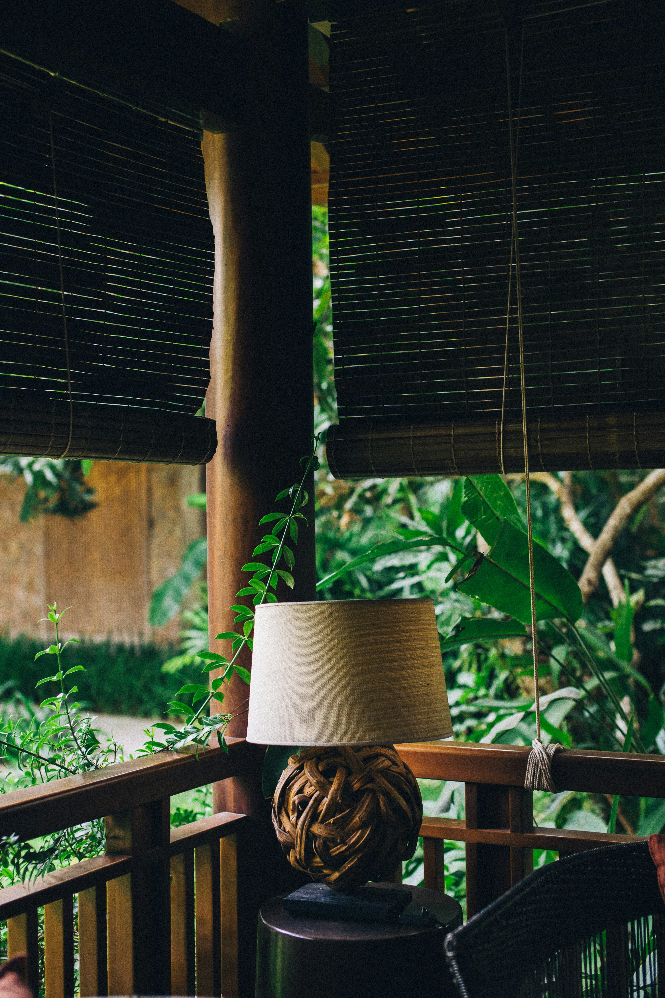 brown woven basket on brown wooden stand